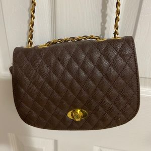 Brown quilted handbag